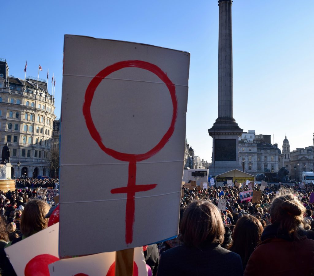 Poster in Trafalgar Square during Women's March on London