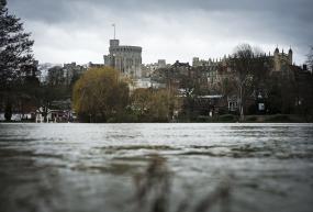 The River Thames creeps slowly higher