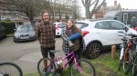 Gary Lee from Full Cycle gives a bike to disadvantaged woman