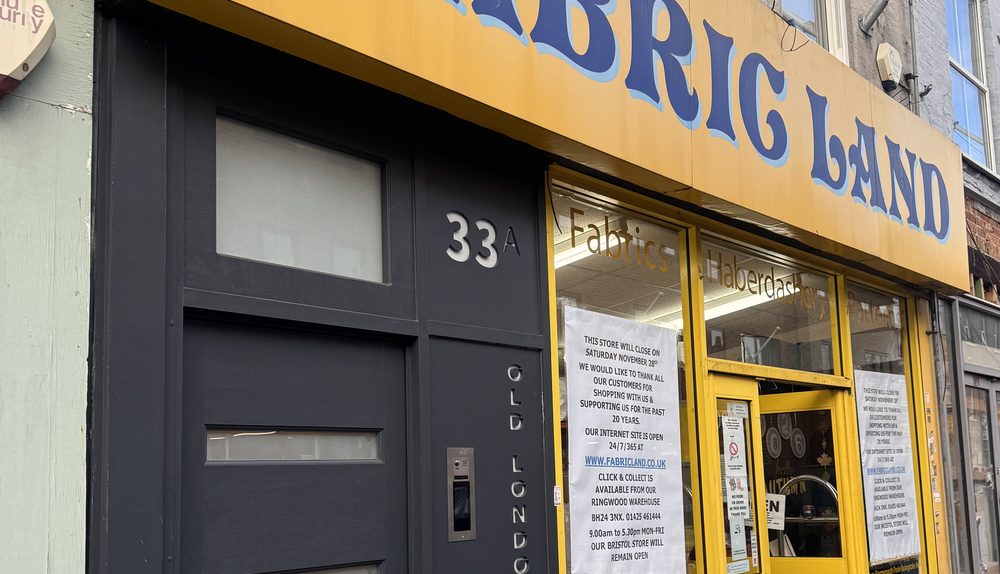 Photo of Fabric Land's shop sign on Old London Road.