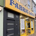 Photo of Fabric Land's shop sign on Old London Road.